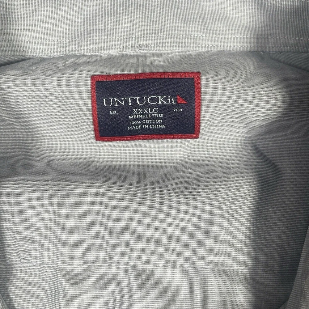 UNTUCKit small tear